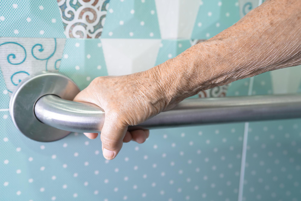 A grab bar installation in the bathroom